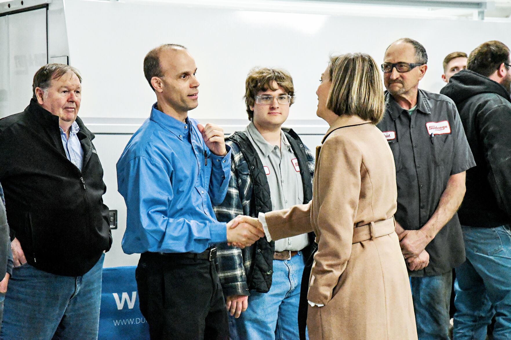 Kim Reynolds, Mike Domnick